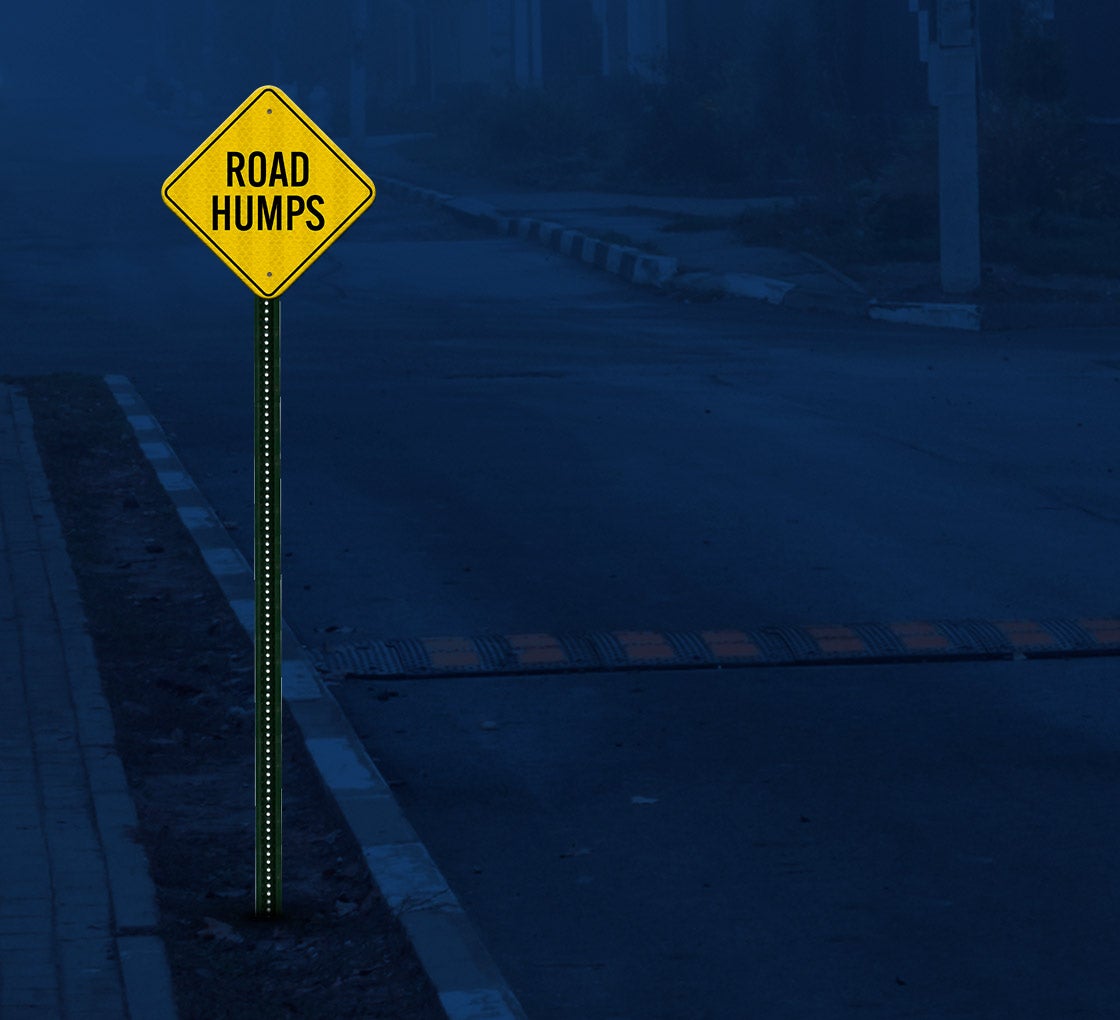 Speed Bumps Ahead. Road Hump Humps Sign - View #3