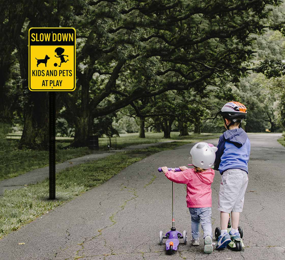 Kids & Pets at Play Slow Down Aluminum Sign (Non Reflective)