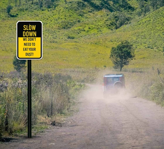 Shop for Slow Down Help Keep Dust Down Aluminum Sign (Non Reflective